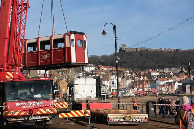 Crane lifts Scarborough tramway carriages away for major revamp. (Credit: Richard Ponter)