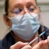 Debbie Bairstow prepares for a vaccination in Scarborough.