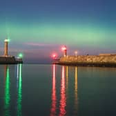 Chris Evans captured this image of the Northern Lights off Whitby, seen here beyond the town's twin piers.