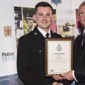 Sergeant Michael Tinsley receiving a bravery award in 2016