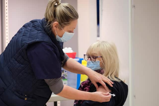 A patient receives their coronavirus vaccine at The Brunswick.
