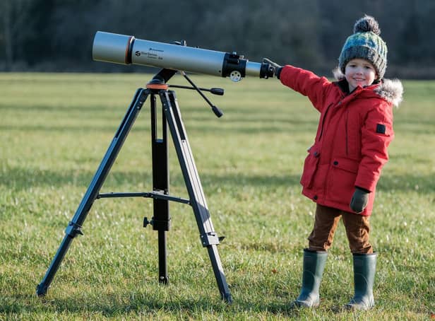 Four-year-old Samuel Startup trying out some astronomy equipment in Dalby Forest. Picture: Tony Bartholomew.