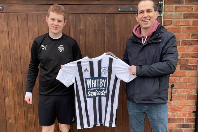 Barrie Harland from Whitby Seafoods and Taylor Humble, Sleights player, show off the new kit sponsored by Whitby Seafoods before the team's 8-2 win over Bagby and Balk at the AC Building and Property Maintenance Sports on Lowdale Lane.