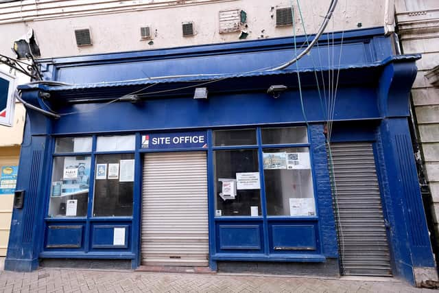 The PDR Construction site office, opposite the extension, is shuttered.