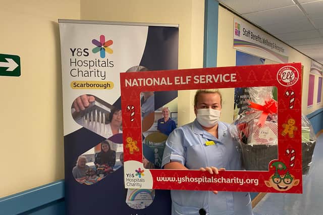 HCA Georgia Adams from Scarborough Hospitals Outpatients Department which organised a festive raffle and tombola and raised £156.