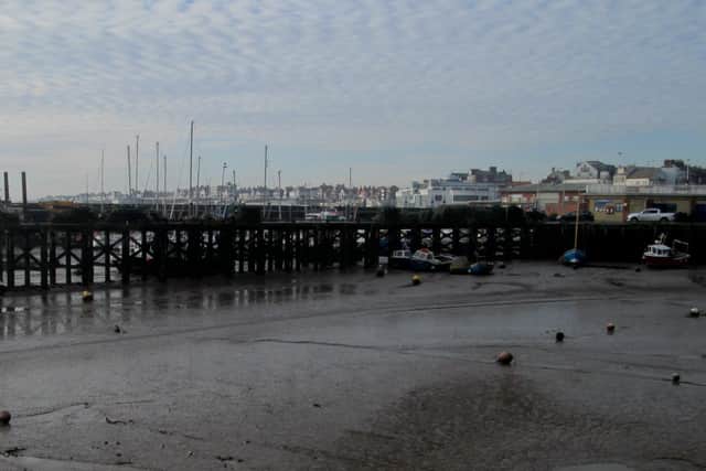 David Jenkinson focuses on Bridlington Harbour during a grey day.