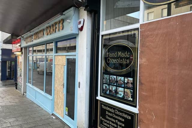 Little Martin Crafts and Crofts Chocolates were boarded up after the fire - pic: Steve Bambridge