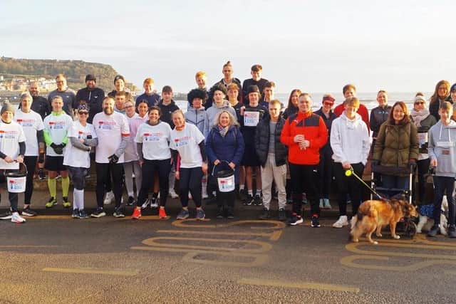 The runners and supporters after the 'Last Leg for Seb' as part of the running challenge in tribute to Seb Smith, raising funds for the Teenage Cancer Trust
Photos by Robert Child