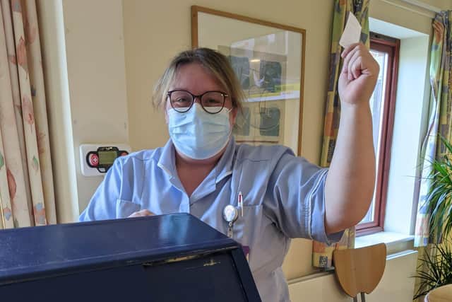 A previous raffle being drawn by Leona Simmons, senior healthcare assistant.