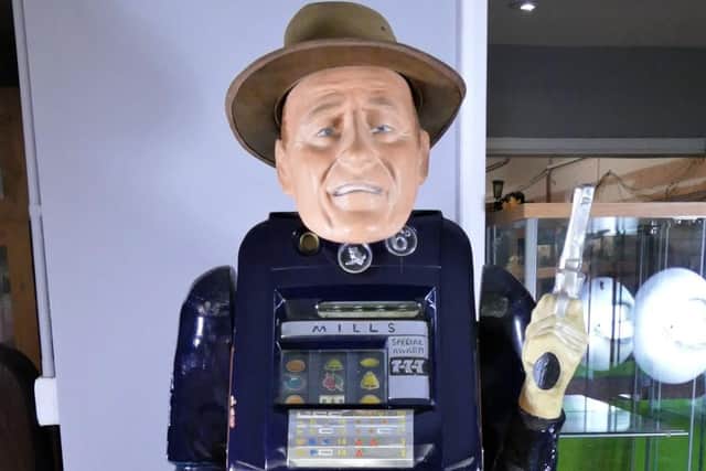 The six foot tall Cowboy one arm bandit by the Mills Novelty Extraordinaire company.