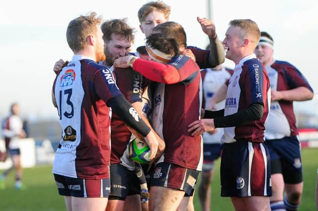 Scarborough RUFC scrum-half Alex Rowley, right, is loving life in the first team after moving up from the Vikings