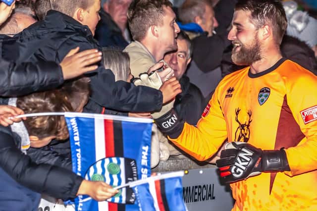 Blues keeper Shane Bland thanks the fans