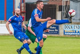 Blues joint-boss Lee Bullock in playing action for Whitby Town