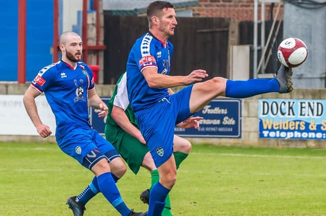 Blues joint-boss Lee Bullock in playing action for Whitby Town