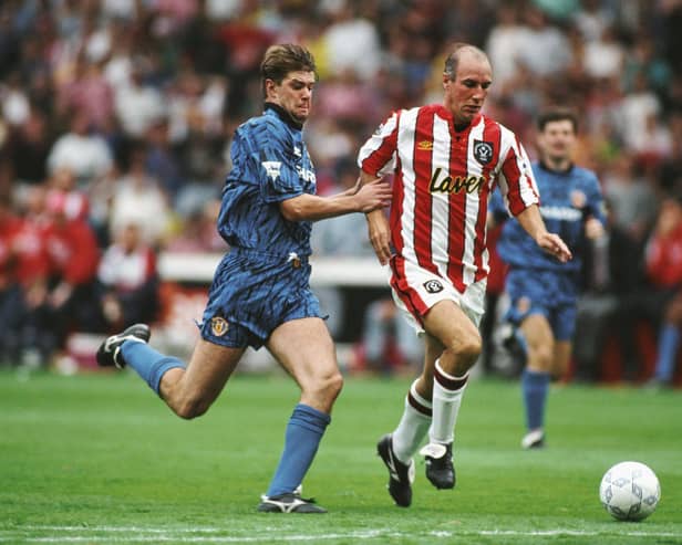 Gary Pallister, left, in action for Manchester United against Sheffield United's Alan Cork in 1992