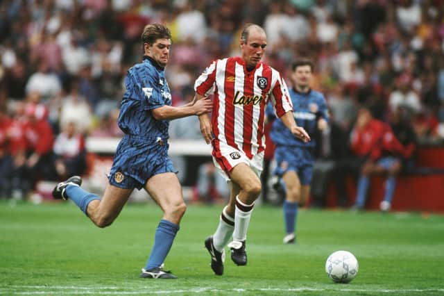 Gary Pallister, left, in action for Manchester United against Sheffield United's Alan Cork in 1992