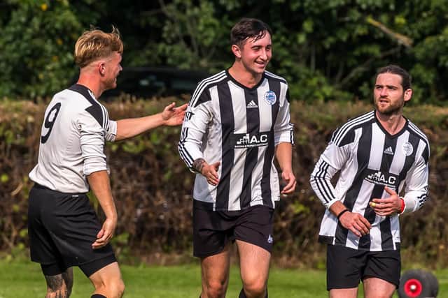 Charlie Smith, left and Jacob Rigden, centre, scored for Sleights in their 8-0 home win against Sinnington