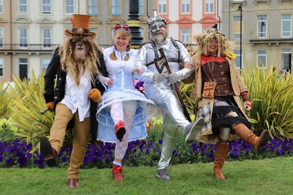 Whitby Steampunk Weekend visitors having fun up on the West Cliff.