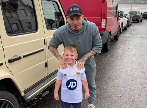 Kalvin Phillips with 5-year-old superfan Ronnie Watson