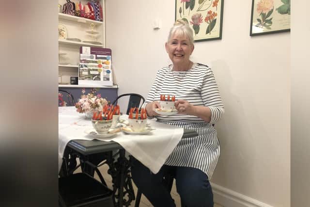 Whitby Town Mayor Cllr Linda Wild enjoys the Regal cheesecake!