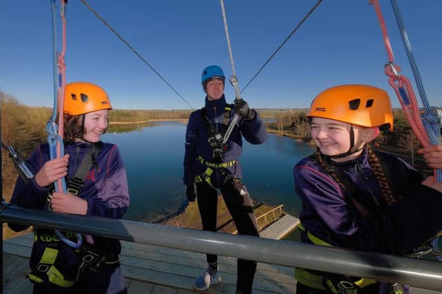 Students from Scarborough College have fun on the zipline.
