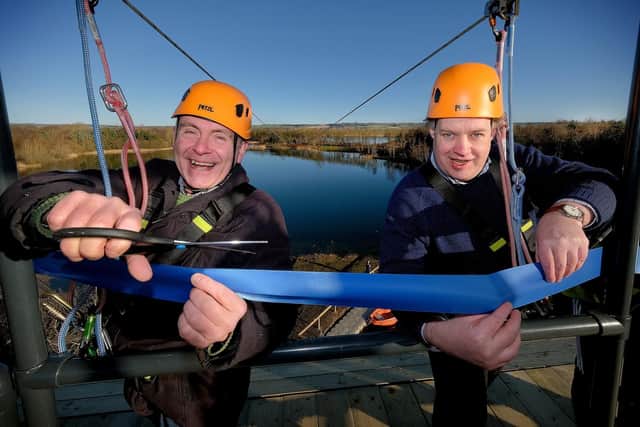Scarborough and Whitby MP Sir Robert Goodwill and Lord Downe prepare to try out the zip wire at North Yorkshire Water Park, near Scarborough.