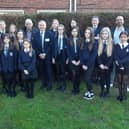 Eskdale School eco team youngsters and staff with guests including Scarborough and Whitby MP Sir Robert Goodwill, Sam Cannon, EJ Music Ltd Managing Director and Cliff Southcombe, Founder of Social Enterprise International.