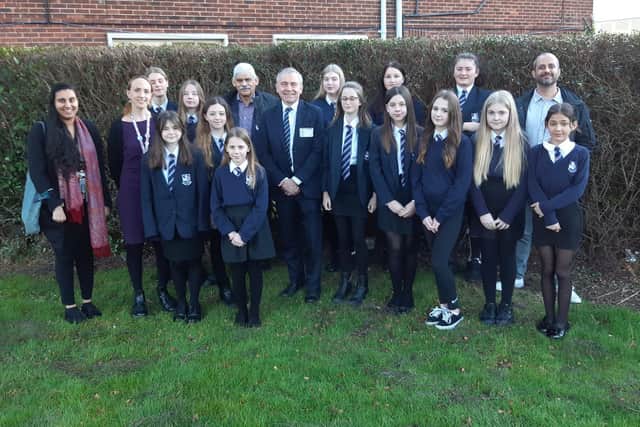 Eskdale School eco team youngsters and staff with guests including Scarborough and Whitby MP Sir Robert Goodwill, Sam Cannon, EJ Music Ltd Managing Director and Cliff Southcombe, Founder of Social Enterprise International.