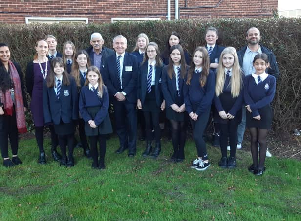 Eskdale School eco team youngsters and staff with guests including Scarborough and Whitby MP Sir Robert Goodwill, Sam Cannon, EJ Music Ltd Managing Director and Cliff Southcombe, Founder of Social Enterprise International.