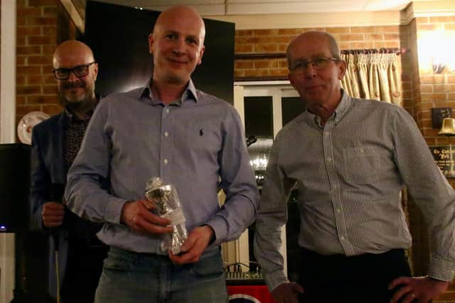 James Briggs, centre, won the most Improved male runner award at the Bridlingtojn Road Runners presentation night