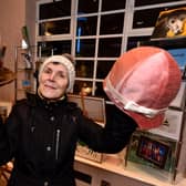 Elena Tradewell makes hats and is one of scores of crafers and artists who use the shop in the theatre foyer to showcase their work