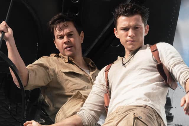 Tom Holland and Mark Wahlberg star in the action-adventure movie Unchartered
