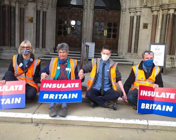 Cllr Theresa Norton (left) glued to the steps of the Royal Courts of Justice. (Photo: Insulate Britain)