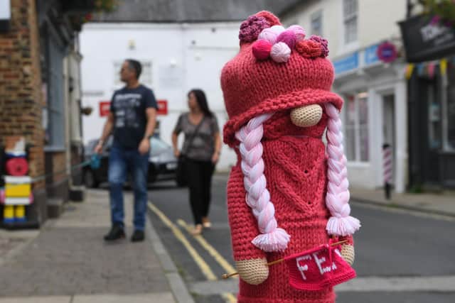Yarnbombing projects lead to objects in public places being covered in decorative knitted or crocheted material as a type of street art.