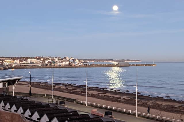 Carol Jackson captures the rays of the Wolf Moon shimmering on the sea.