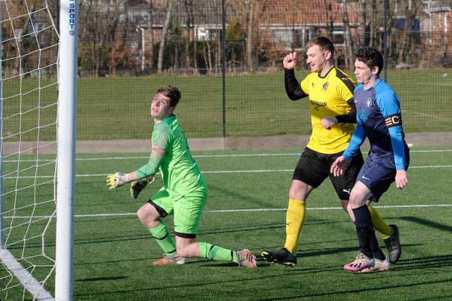 Cayton's keeper and skipper look on as Traf score during their 10-2 Sunday FA Cup win
Photo by Richard Ponter