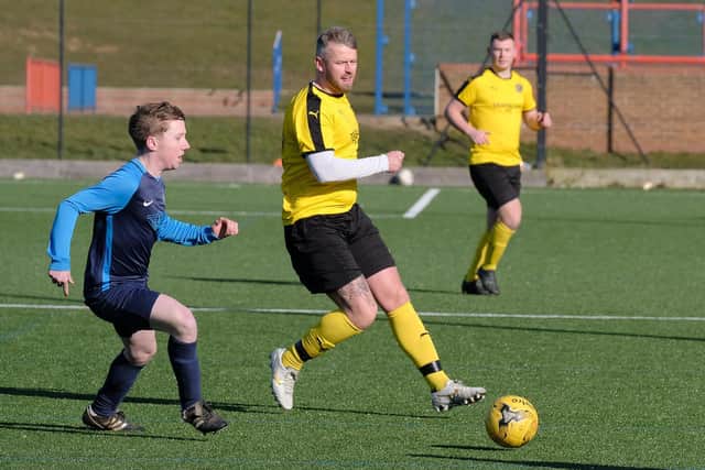 Sean Exley, yellow kit, scored five goals for Trafalgar in their 10-2 defeat of Cayton