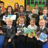 Youngsters from Stakesby Primary Academy, Whitby, with some of the new books.