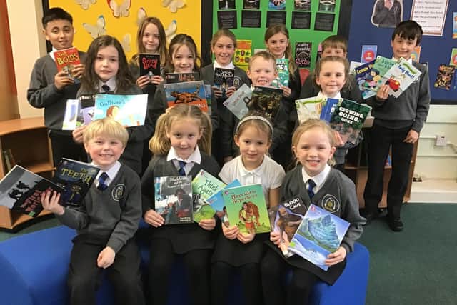 Youngsters from Stakesby Primary Academy, Whitby, with some of the new books.