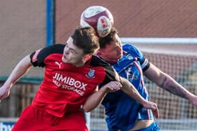 Whitby Town skipper Daniel Rowe in action during Bamber Bridge win