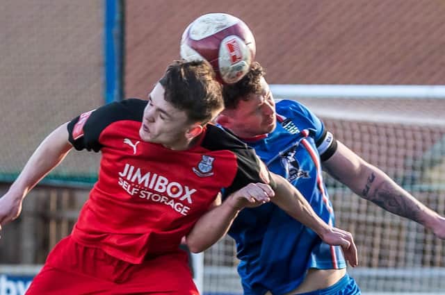 Whitby Town skipper Daniel Rowe in action during Bamber Bridge win