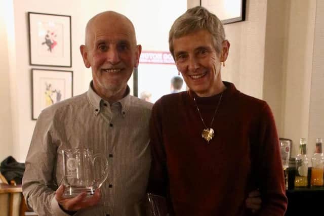 Stalwarts Bob Eyre and Judy Allisson handed Outstanding Service awards by Bridlington Road Runners