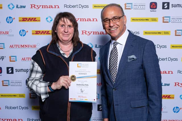 Jo Milnes collects her certificate from star entrepreneur Theo Paphitis.