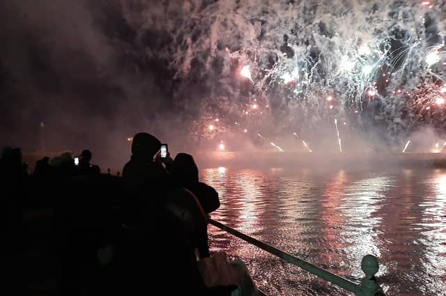 People around The Bandstand in Whitby watching the fireworks display.