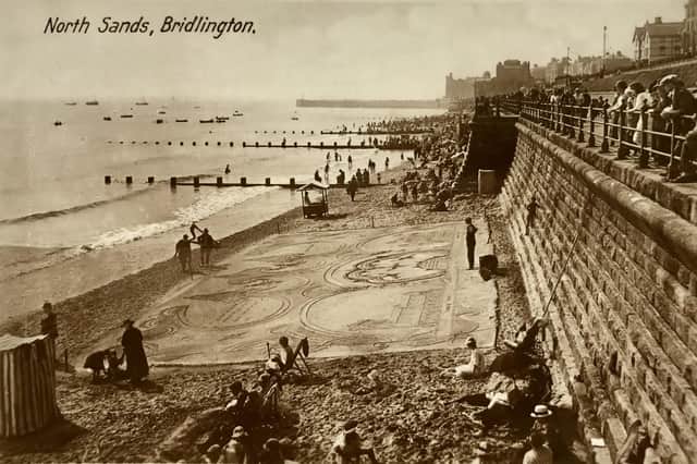 This postcard, date stamped August 1928, shows some impressive beach art on Bridlington’s north beach.