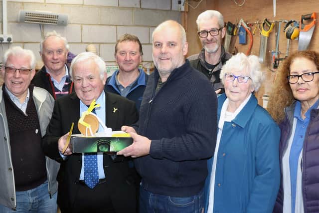 Members of the Whitby Area Sheds project and Cllr Jim Clark with a model of the sculpture they were planning to create (picture 2020). From left, Graham Storer, Malcolm Watson, North Yorkshire County Council chairman Cllr Jim Clark, Steven Marsh, Ian Wallis, Brian Holliday, Veronica Foster and Maggie Kilpatrick at the Sheds project in Staithes.