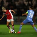 Beth Mead, of Arsenal, is challenged by Diana Bartovicova of Slavia Prague as Veronika Pincova looks on during the UEFA Women's Champions League match on August 31, 2021