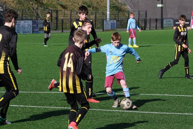 Cayton U13s on the attack in the 9-1 home win against Scalby U13s