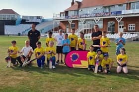 The 2021 Dynamos show off their certificates at Scarborough Cricket Club