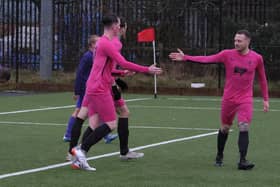 Cayton, pink kit, defeated Goal Sports 4-0 on Friday nighr